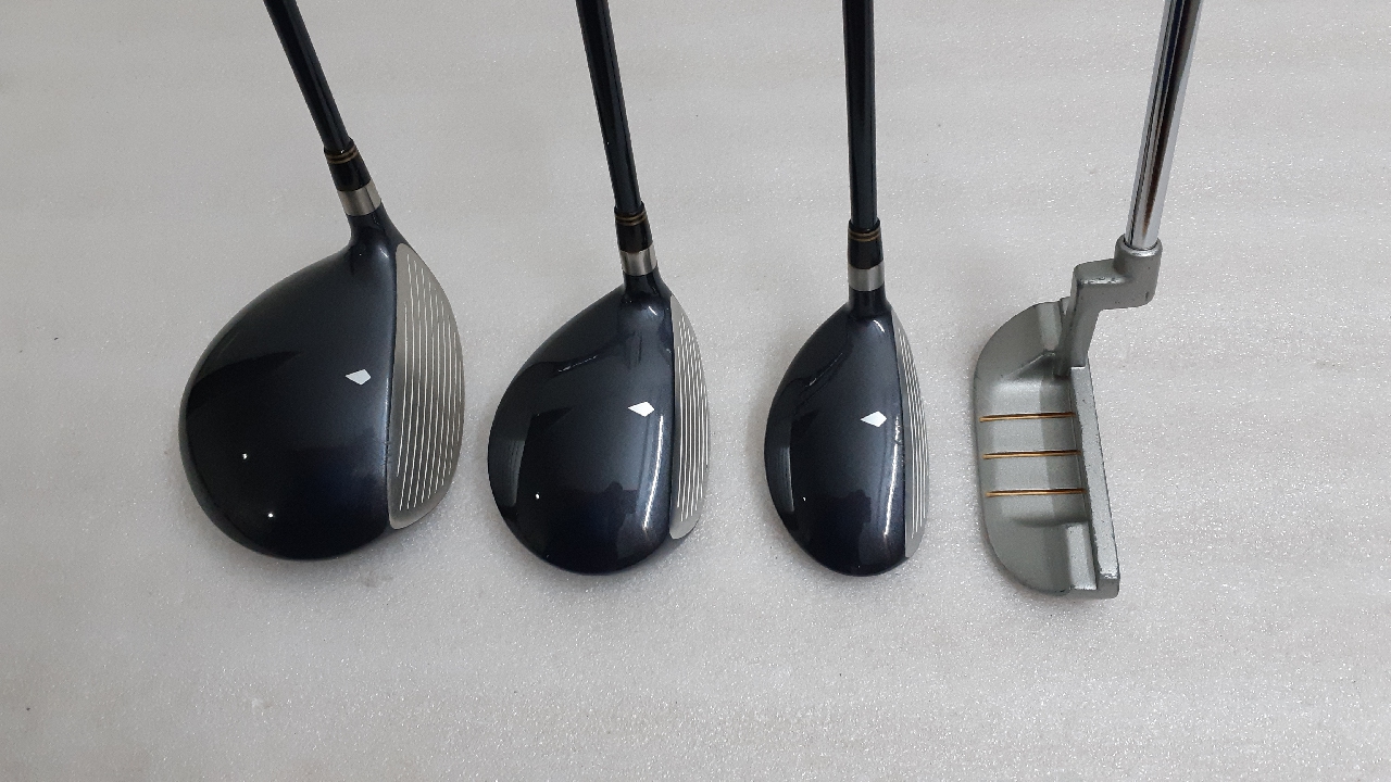 full set of golf clubs in bag