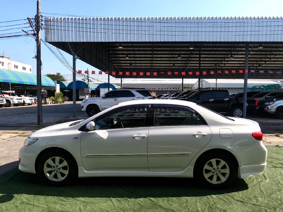 Toyota Corolla Altis 1.6 E CNG โรงงาน เกียร์ออโต้ ปี​ 2012 สีขาว