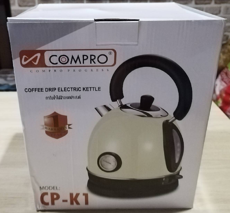 ขายกาต้มน้ำไฟฟ้า สไตล์วินเทจ ยี่ห้อ COMPRO รุ่น CP-K1 ขนาด 1.8 ลิตร สีขาว สภาพดี มือสอง